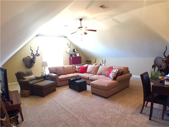 525 Sugar Flat Road Lebanon, TN 37087 - Photo 13 of 20 a living room with furniture and a ceiling fan