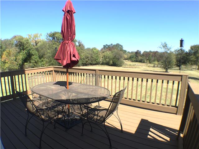 525 Sugar Flat Road Lebanon, TN 37087 - Photo 17 of 20 a view of a two chairs and table in the balcony