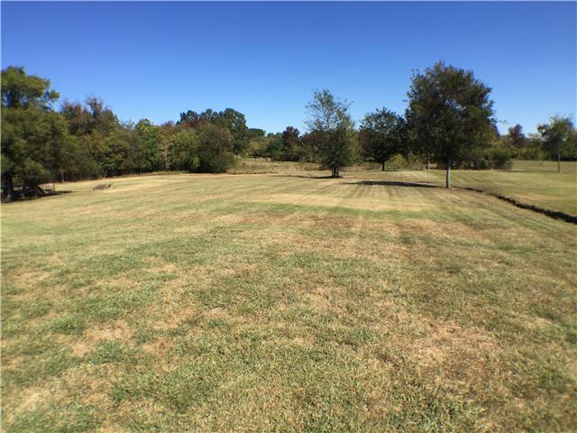 525 Sugar Flat Road Lebanon, TN 37087 - Photo 19 of 20 a view of a swimming pool with an outdoor space and seating area