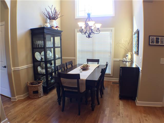525 Sugar Flat Road Lebanon, TN 37087 - Photo 3 of 20 a view of a dining room with furniture wooden floor and chandelier
