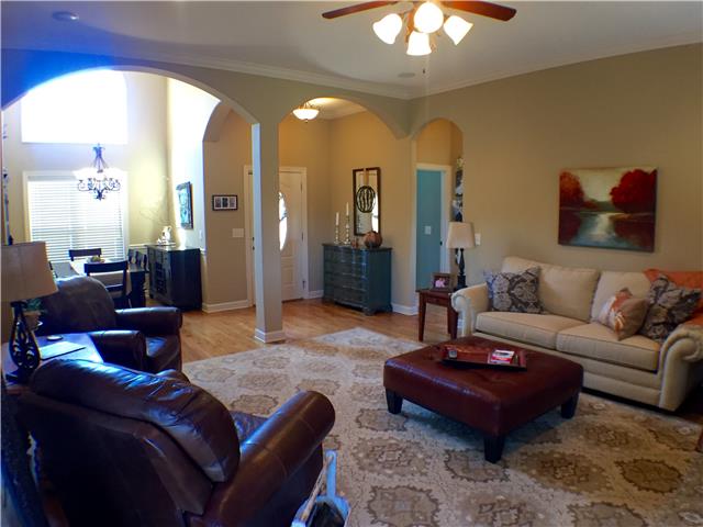 525 Sugar Flat Road Lebanon, TN 37087 - Photo 4 of 20 a living room with furniture and a chandelier