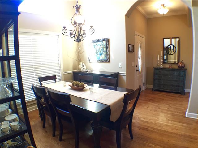525 Sugar Flat Road Lebanon, TN 37087 - Photo 5 of 20 a dining room with a wooden table and chairs