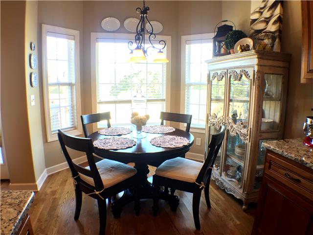 525 Sugar Flat Road Lebanon, TN 37087 - Photo 9 of 20 a view of a dining room with furniture wooden floor and chandelier