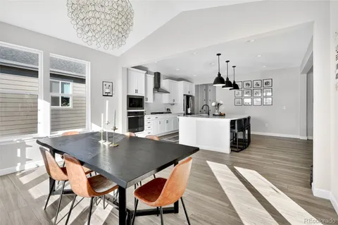 a bed room with a bed and a lamp