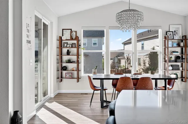 a bathroom with a double vanity sink toilet mirror and shower