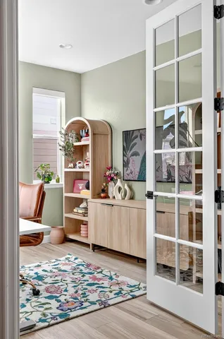 a living room with furniture and a rug