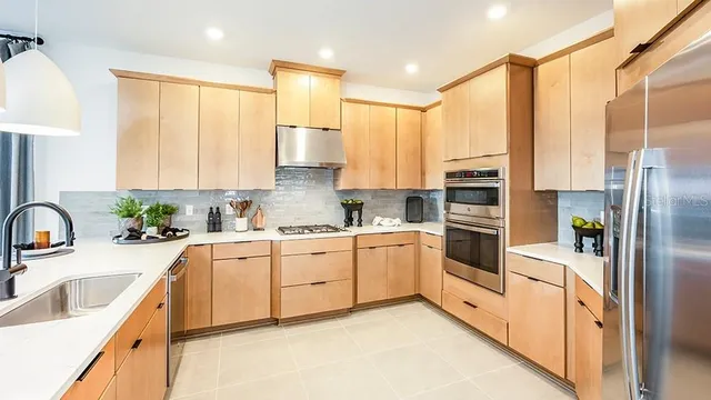 a bathroom with a sink and mirror