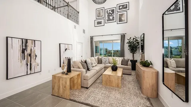 a dining room with furniture window and wooden floor