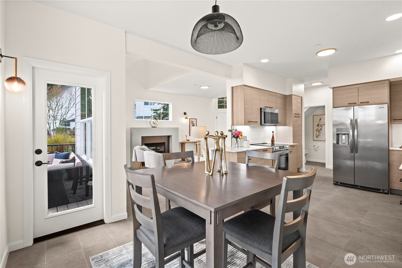 23202 Fitzgerald Road, Unit 2 Bothell, WA 98021 - Photo 5 of 20 a dining room with furniture and window