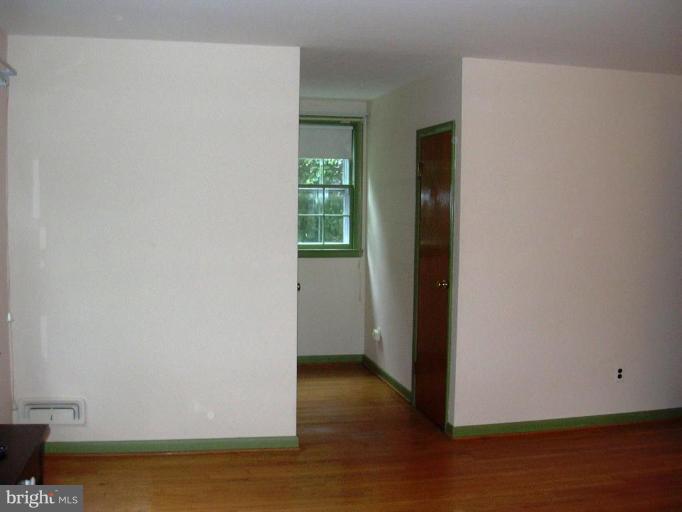 7005 Wardman Road Baltimore, MD 21212 - Photo 13 of 15 MASTER BEDROOM HAS TWO WALK IN CLOSETS