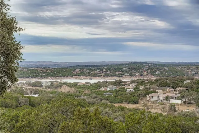 a view of a city with lots of trees