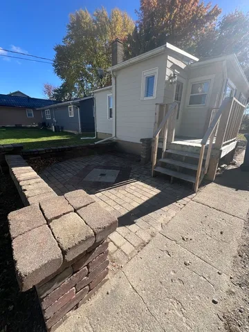 a view of backyard with seating space