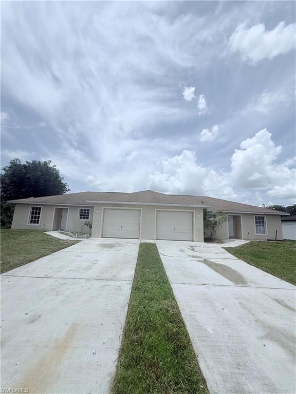 front view of house with a yard