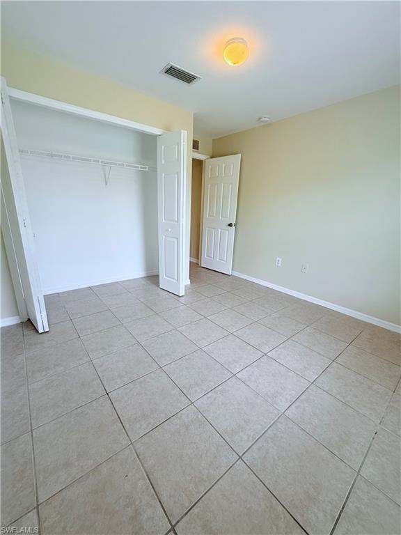 5212 30th Street Southwest Lehigh Acres, FL 33973 - Photo 9 of 15 a view of an empty room