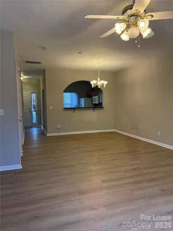 a view of a livingroom with a kitchen