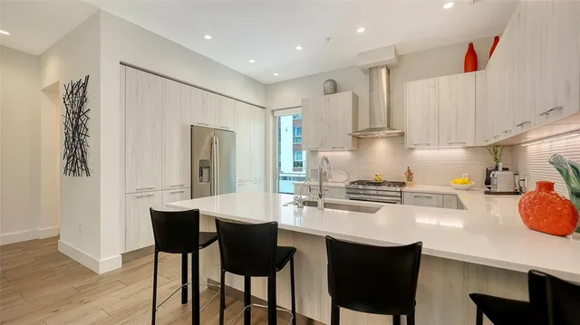 a kitchen with a sink and a window