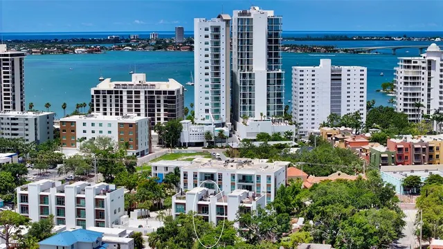 a view of a building with a tree