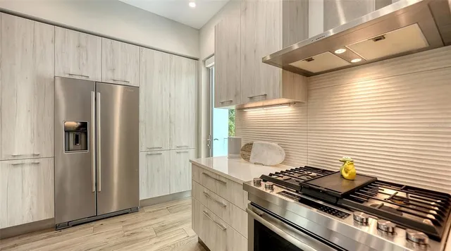 a view of a chairs and table in the patio