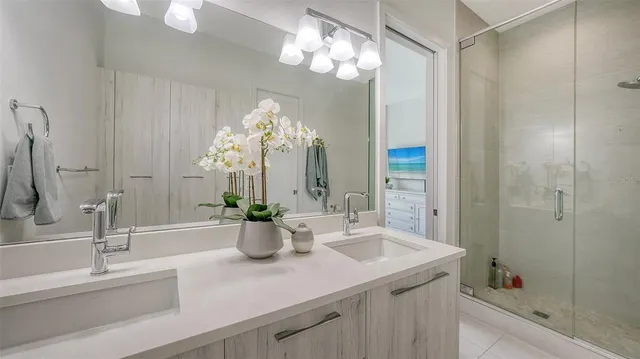 a view of a backyard with table and chairs