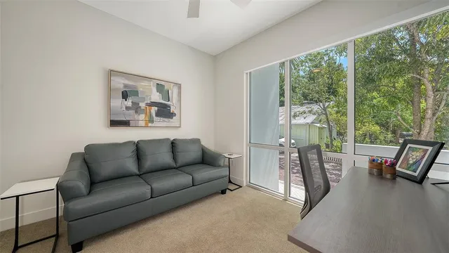 a view of a balcony with chairs