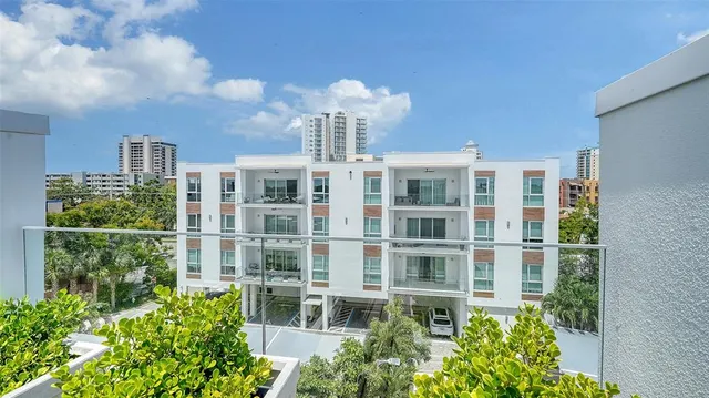 a view of a city with tall buildings