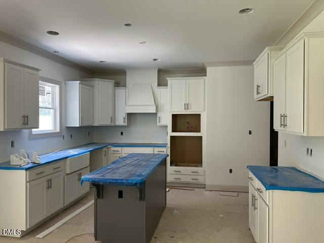 119 Big Pine Road Clayton, NC 27520 - Photo 7 of 21 a kitchen with a sink a stove a refrigerator and a cabinets