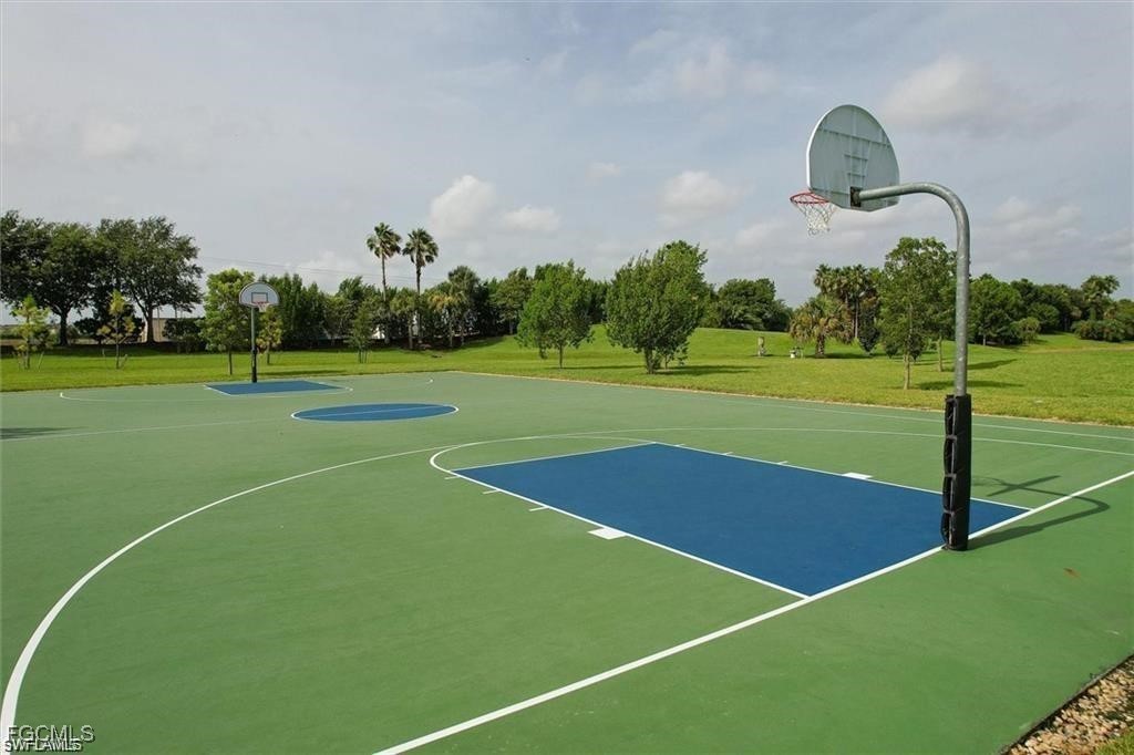 14309 Oviedo Place Fort Myers, FL 33905 - Photo 27 of 30 a view of a tennis court