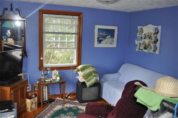23 Clancy Road Boston, MA 02124 - Photo 7 of 11 a living room with furniture and a window