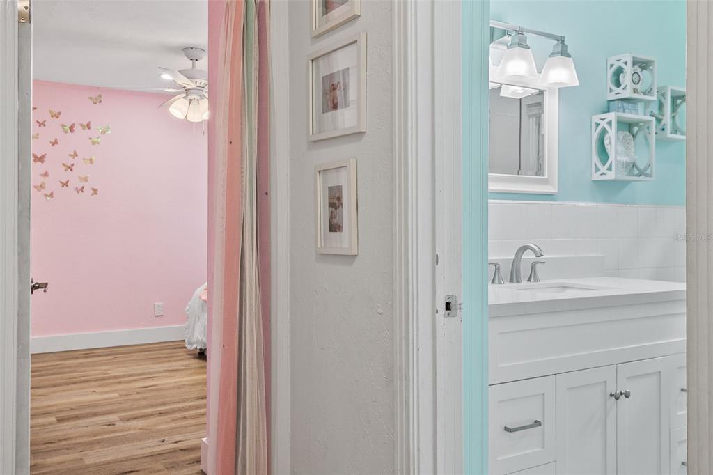 2215 Hibiscus Street Sarasota, FL 34239 - Photo 25 of 69 a bathroom with a sink vanity and a mirror