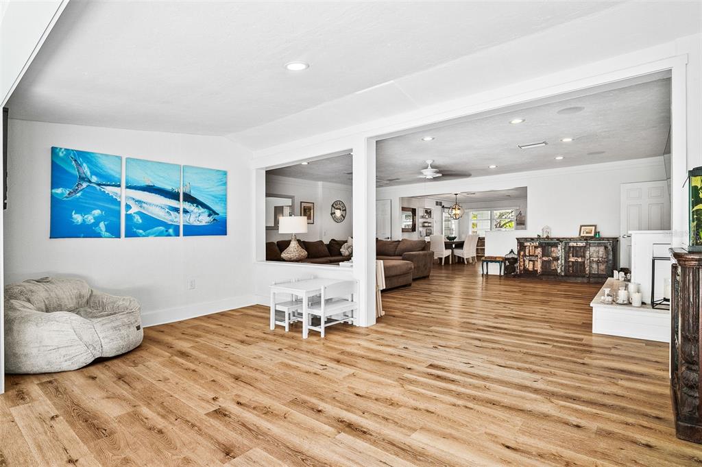 2215 Hibiscus Street Sarasota, FL 34239 - Photo 44 of 69 a living room with furniture and wooden floor