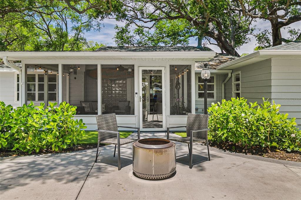 2215 Hibiscus Street Sarasota, FL 34239 - Photo 6 of 69 front view of a house with potted plants