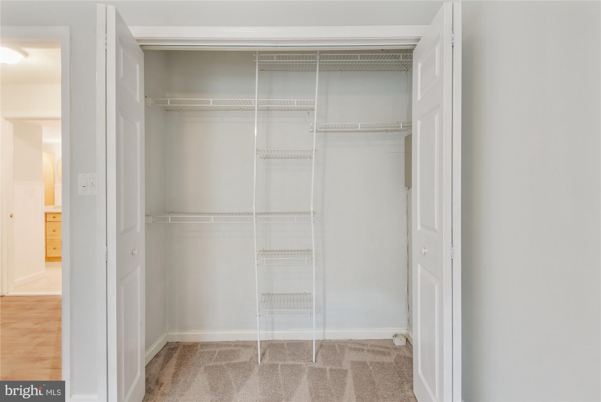 8353 Dunham Court, Unit 648 Springfield, VA 22152 - Photo 22 of 33 Large closet with built-in shelving in spare room
