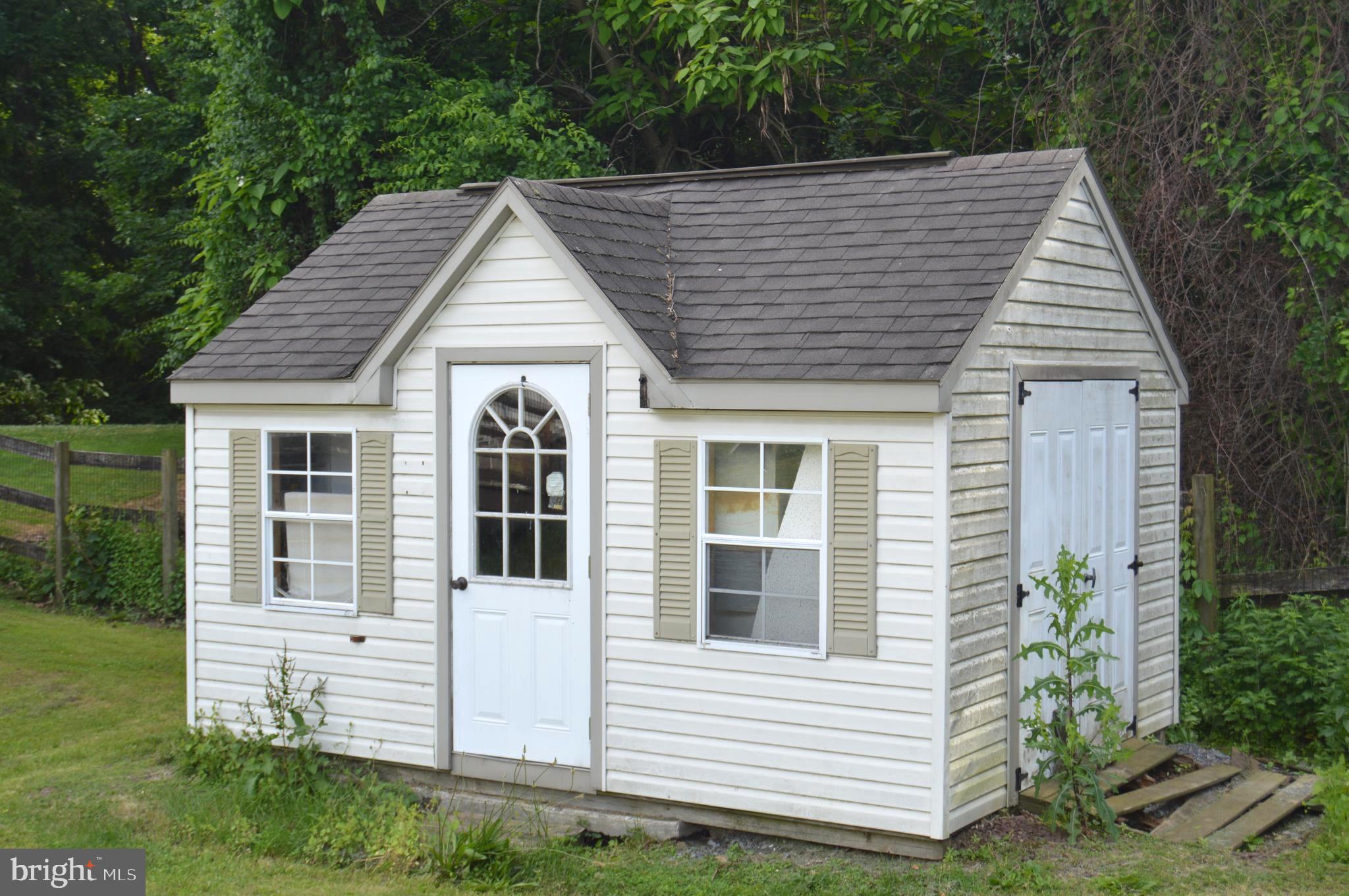 46 Mountain Spring Road Blandon, PA 19510 - Photo 11 of 18 a view of a house with a yard