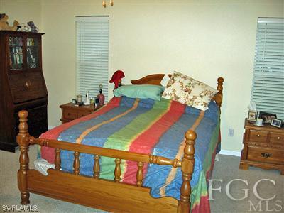 10683 Holly Road Bokeelia, FL 33922 - Photo 5 of 10 a room with musical instruments