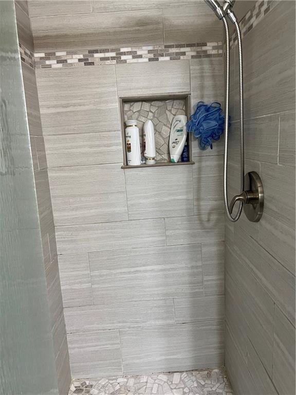 1027 Christy Road Hermitage, PA 16148 - Photo 15 of 25 walk in ceramic tile shower