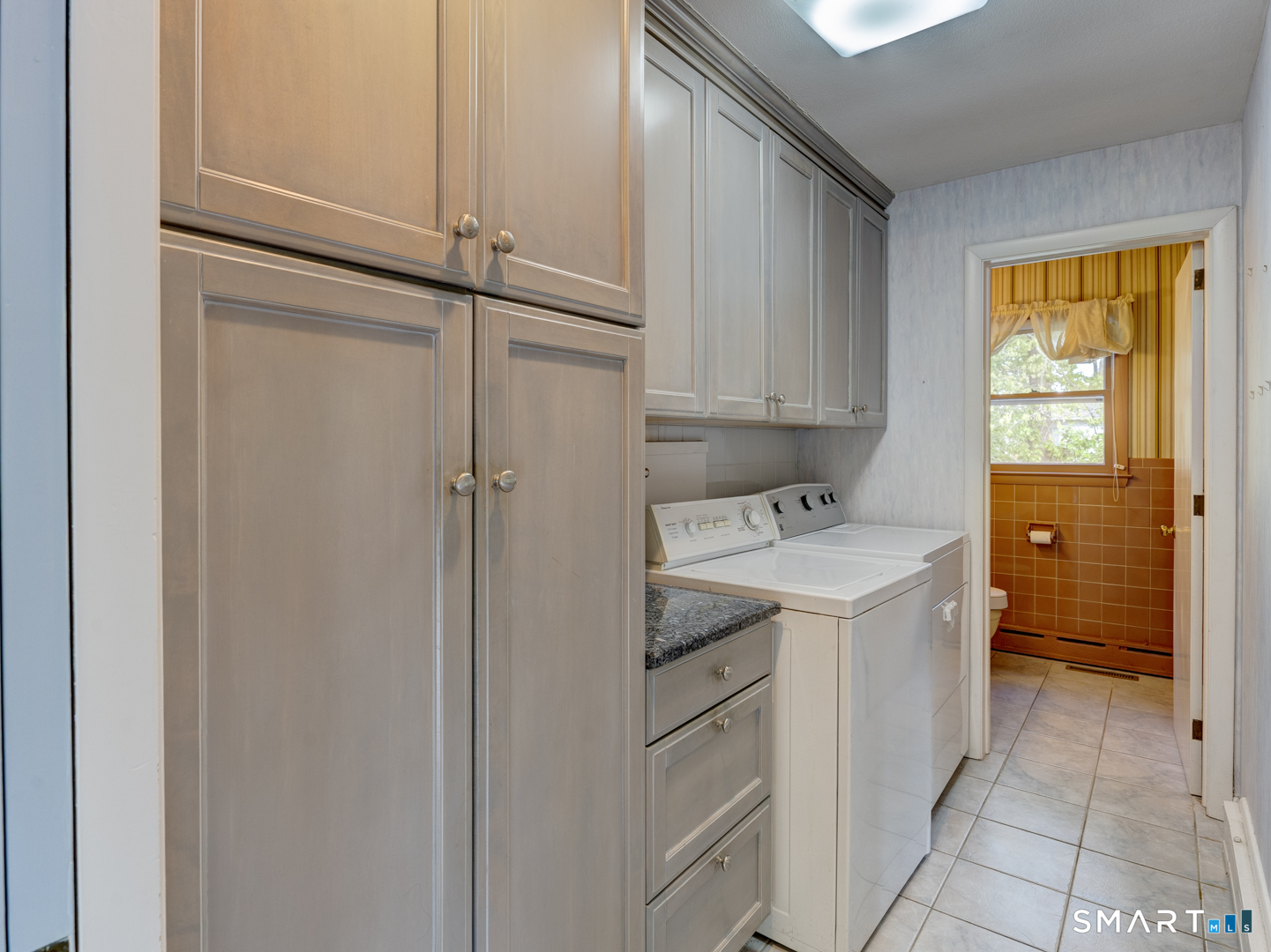 284 Chestnut Hill Road Torrington, CT 06790 - Photo 15 of 37 First floor laundry room and half bath