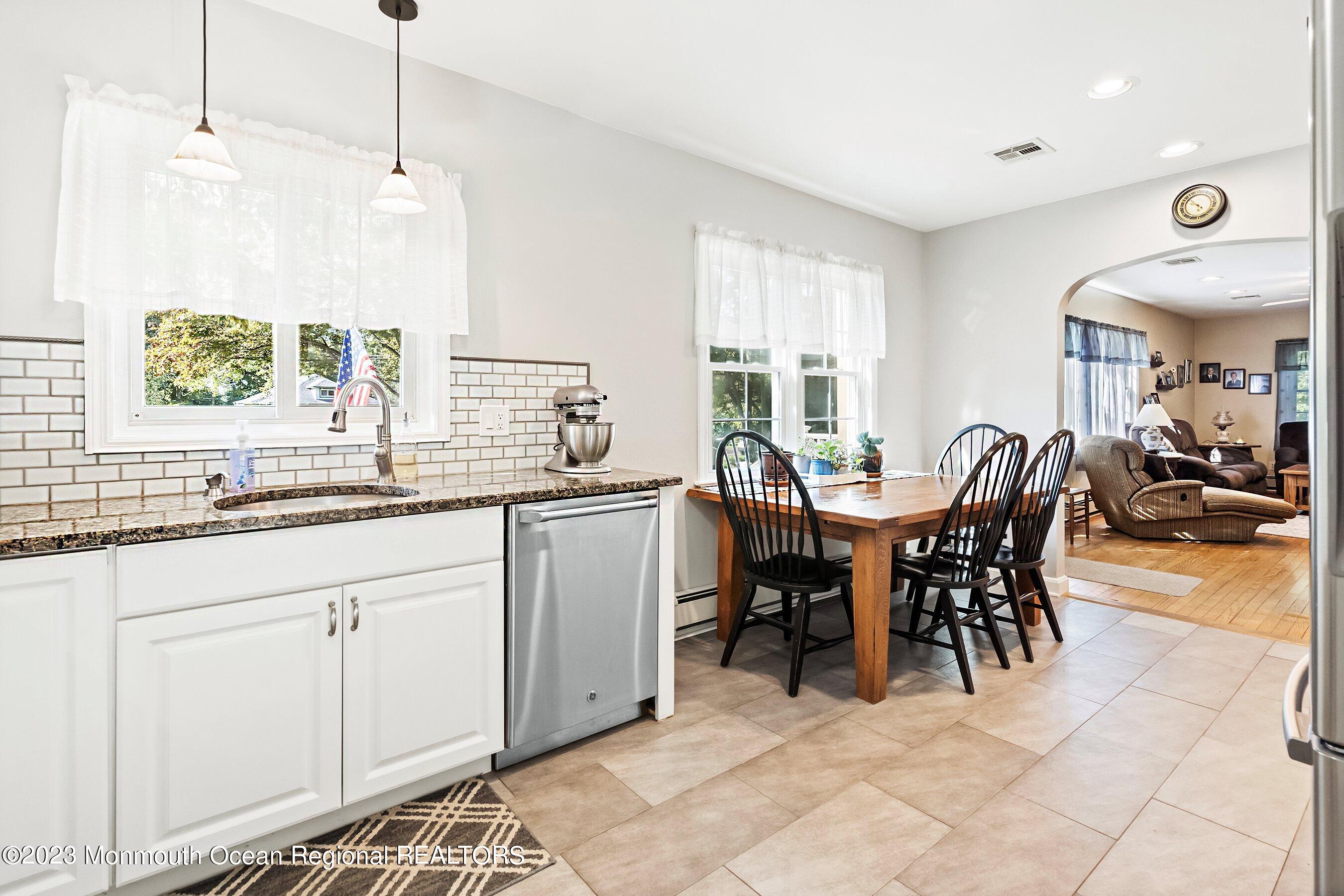 154 Adelphia Road Farmingdale, NJ 07727 - Photo 12 of 34 a view of a dining area with furniture