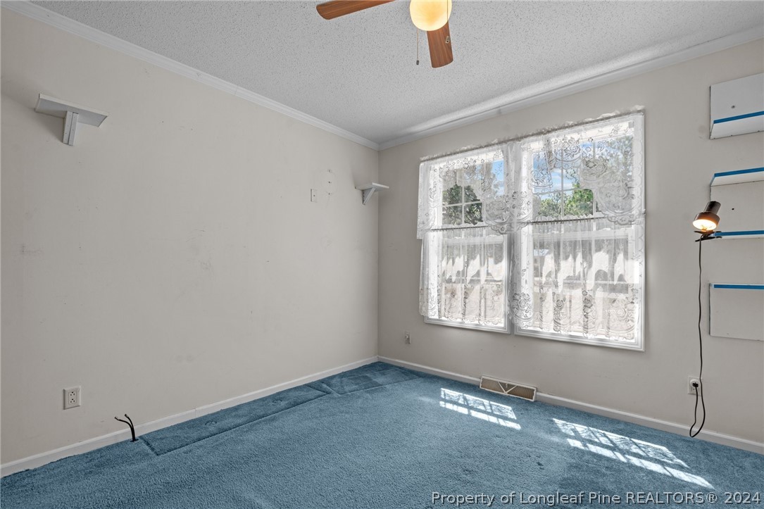140 Ridge View Drive Cameron, NC 28326 - Photo 28 of 42 a view of an empty room with a window