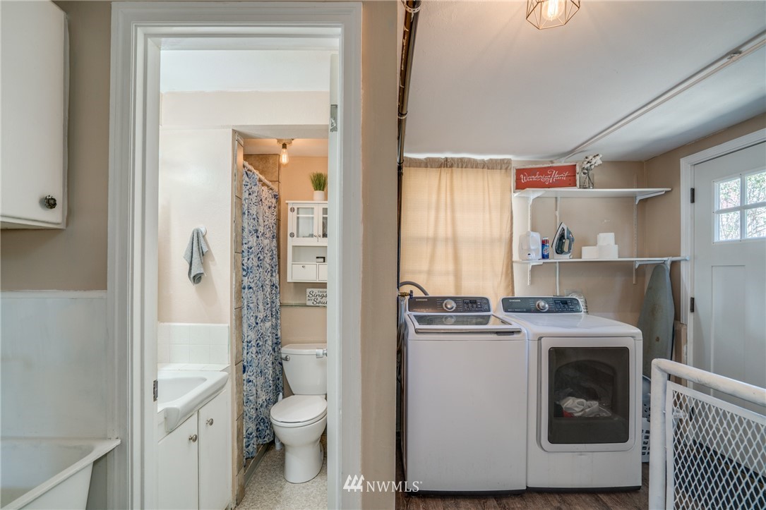 1036 Tyler Street Wenatchee, WA 98801 - Photo 18 of 29 a view of bathroom with a toilet sink and a mirror