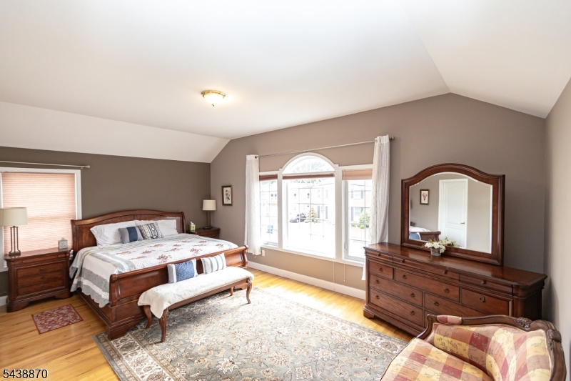 419 Putnam Road Union, NJ 07083 - Photo 20 of 37 a bed room with a bed and a large window