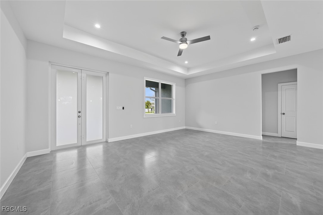2864 68th Avenue Northeast Naples, FL 34120 - Photo 13 of 47 a view of an empty room with a window