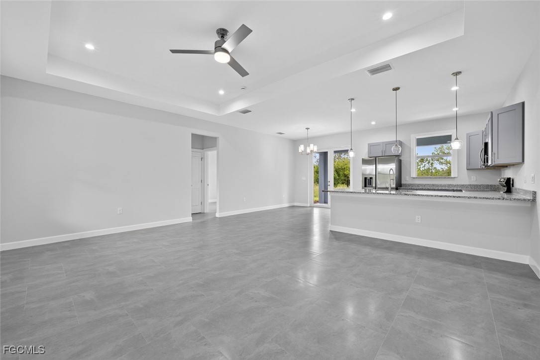 2864 68th Avenue Northeast Naples, FL 34120 - Photo 17 of 47 a view of a kitchen with a sink and a window