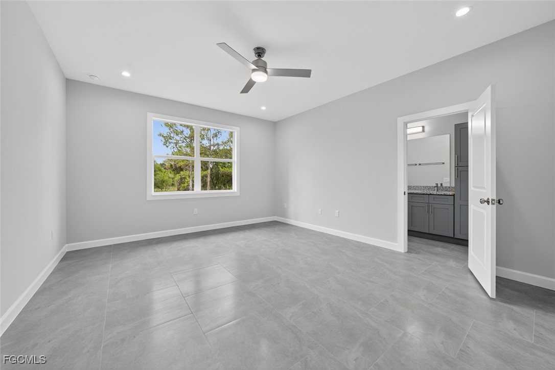 2864 68th Avenue Northeast Naples, FL 34120 - Photo 29 of 47 an empty room with windows and closet