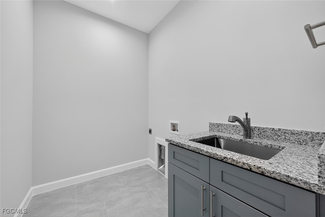 2864 68th Avenue Northeast Naples, FL 34120 - Photo 40 of 47 a close view of sink and tap