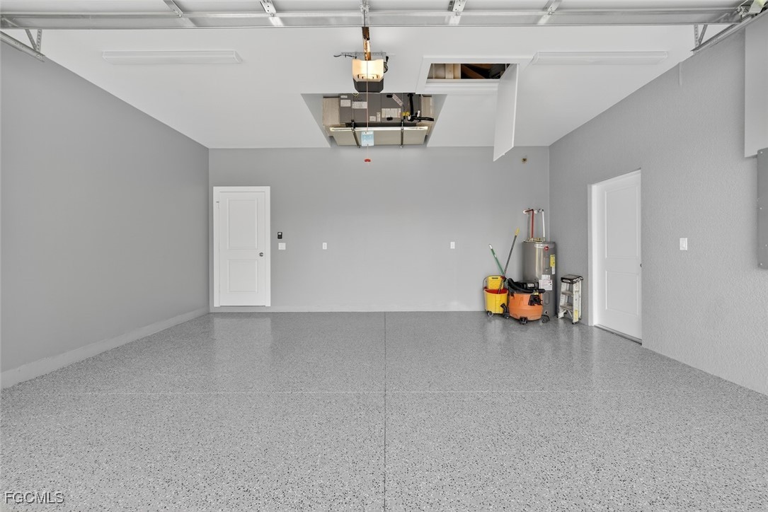 2864 68th Avenue Northeast Naples, FL 34120 - Photo 42 of 47 a view of a room with a garage