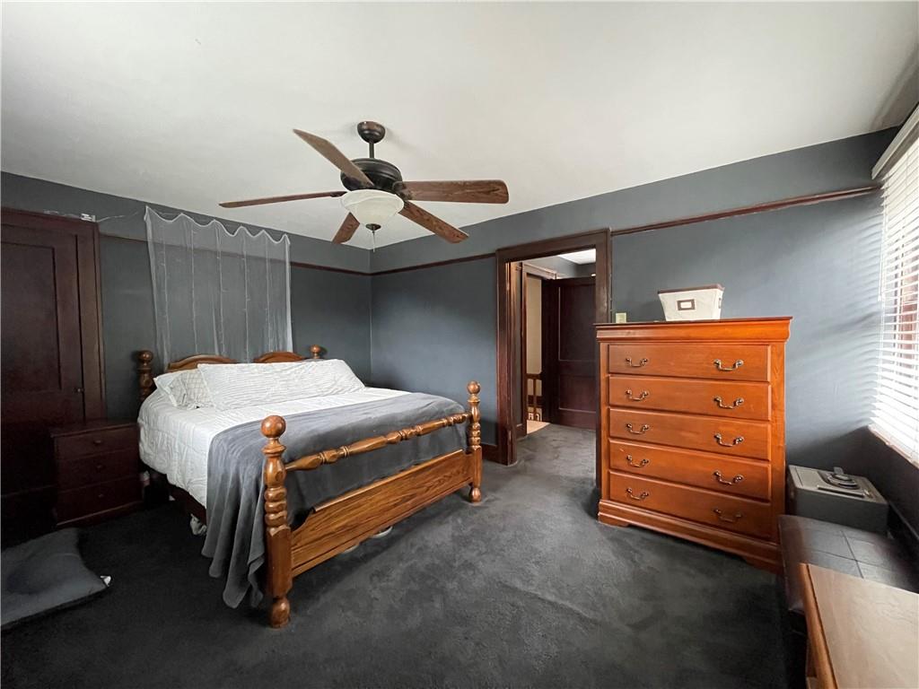 429 Crawford Run Road Creighton, PA 15030 - Photo 11 of 24 a bedroom with a bed and a ceiling fan