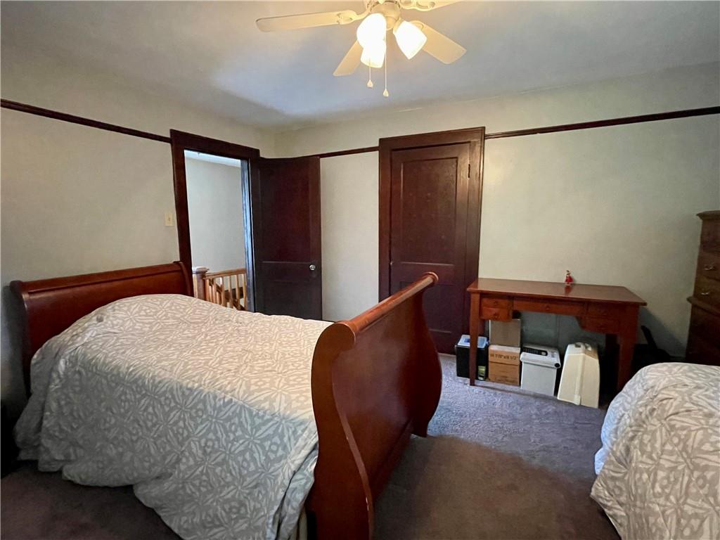 429 Crawford Run Road Creighton, PA 15030 - Photo 14 of 24 a bedroom with a bed and chair