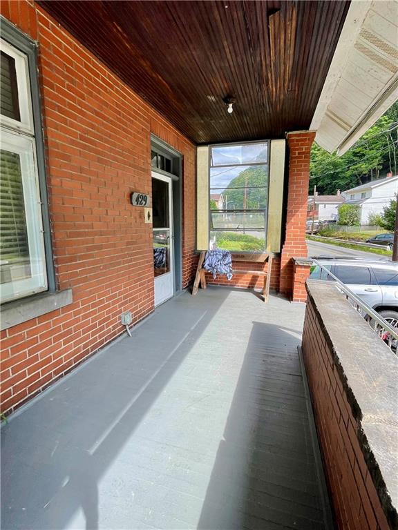 429 Crawford Run Road Creighton, PA 15030 - Photo 2 of 24 a view of a patio with a table chairs and a barbeque
