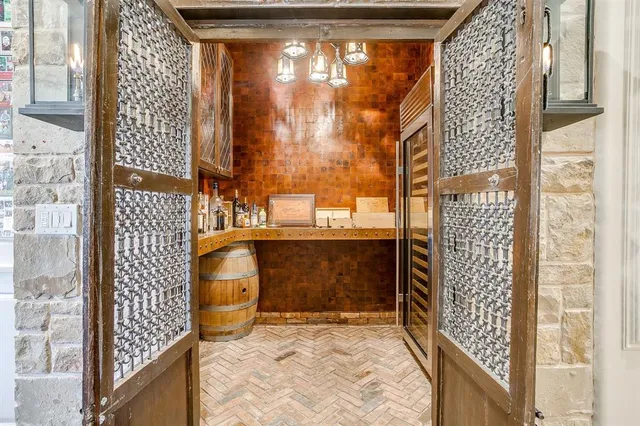 a spacious bathroom with a double vanity sink a mirror and a shower