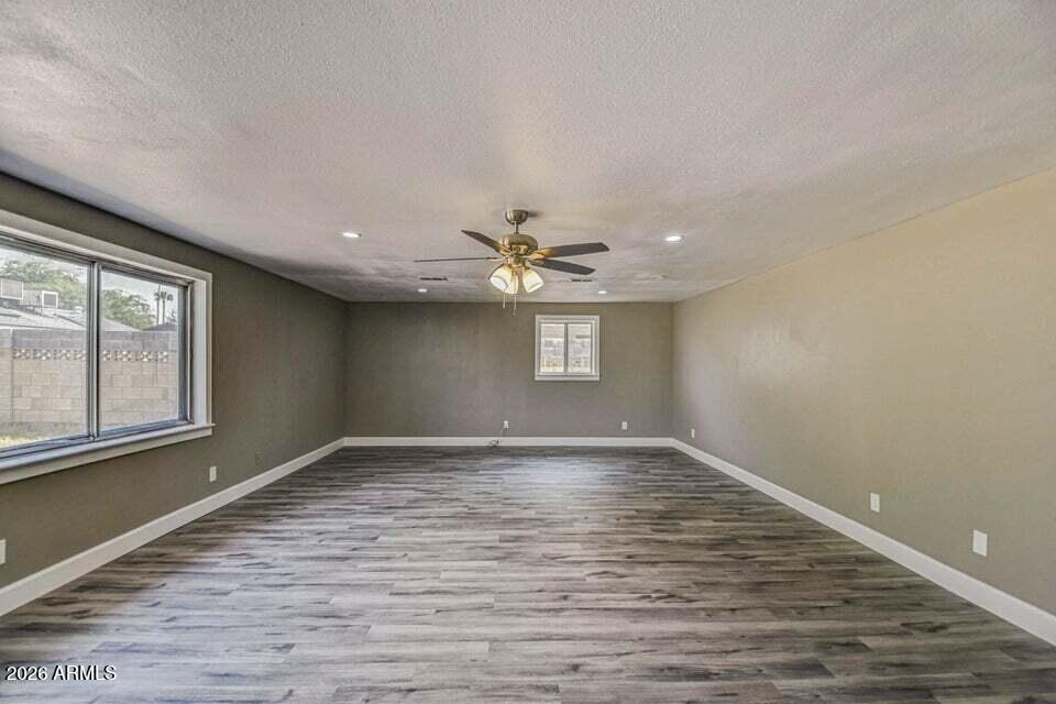 3640 West Banff Ln. Phoenix, AZ 85053 - Photo 11 of 26 Living Room Unfurnished